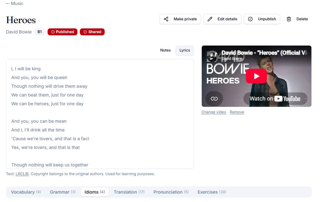 A song lesson with the official music video playing beside the clean, readable lyrics